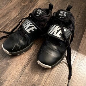 Nike team hustle sneakers